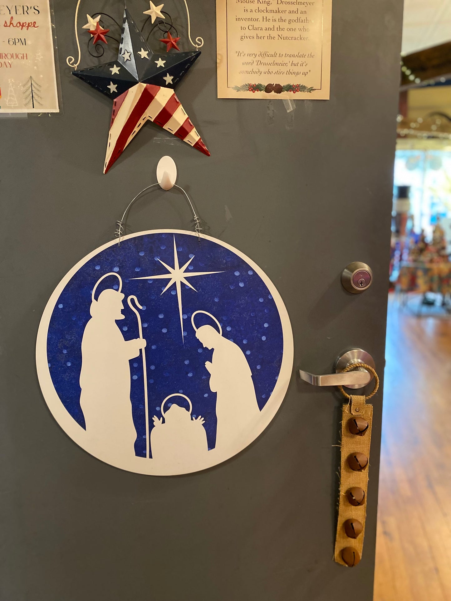 Outdoor metal art round nativity door hanger