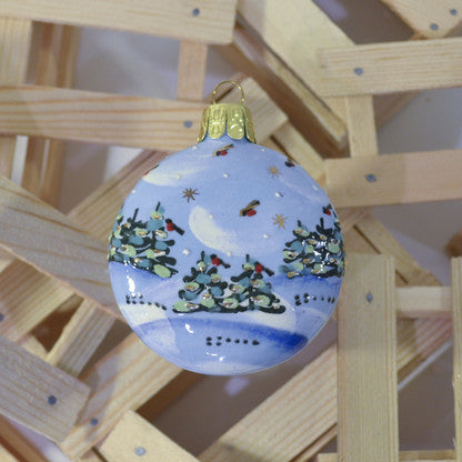 Evergreens with birds small round ornament