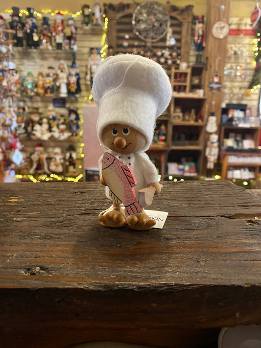 Chef with fish and knife