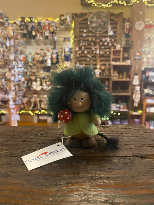 Troll with blue hair and holding Mushroom